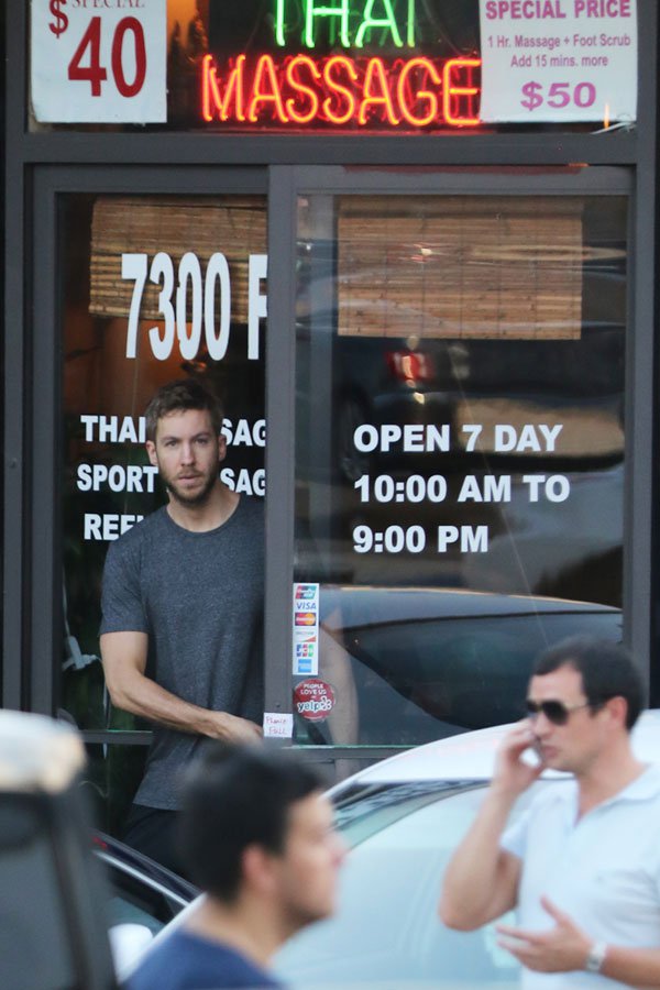 EXCLUSIVE: Calvin Harris (Taylor Swift's boyfriend) spotted leaving a cheap Thai massage parlor in Los Angeles after spending around two hours inside in the early evening. A sign outside the door advertises $40 and $50 massages. Pictured: Calvin Harris Ref: SPL1119875 080915 EXCLUSIVE Picture by: Splash News Splash News and Pictures Los Angeles:310-821-2666 New York:212-619-2666 London:870-934-2666 photodesk@splashnews.com 