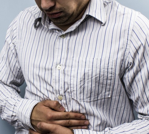 Multi racial man with constipation