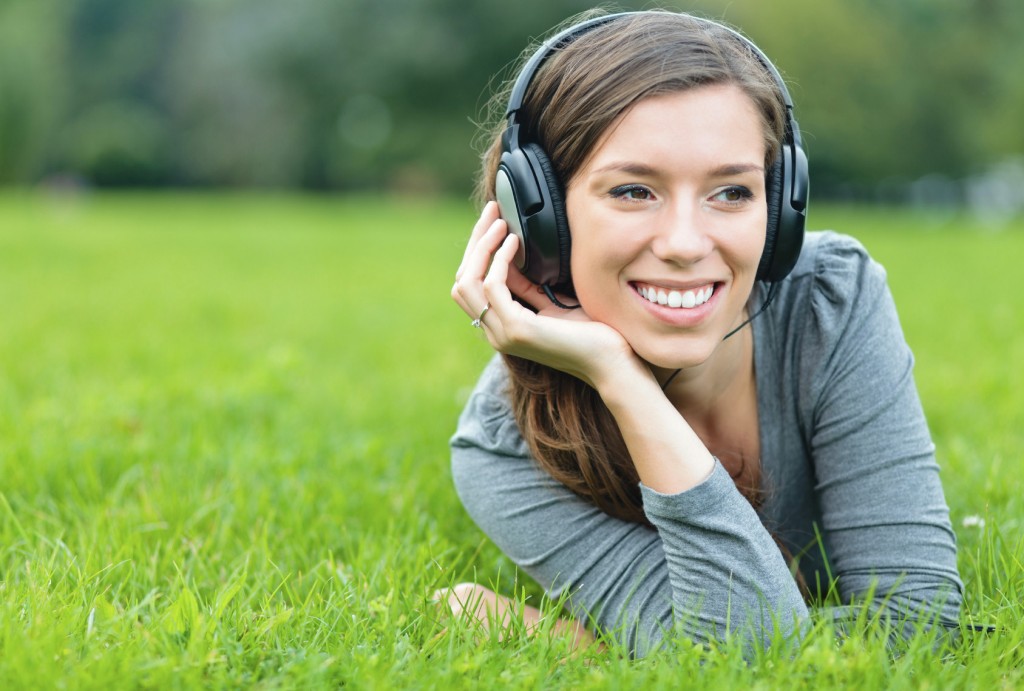 stock-photo-17842813-woman-listening-to-the-music1