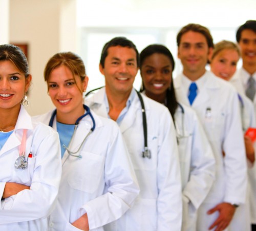 Group of doctors in a row at a hospital